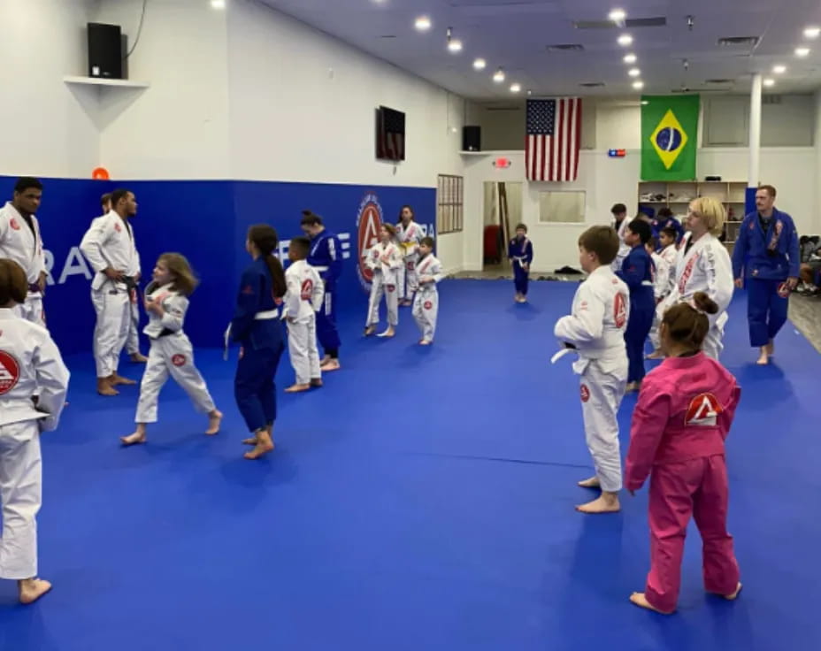 a group of people in a karate class