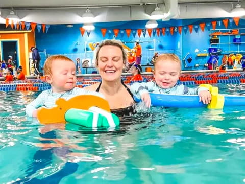 a group of kids in a pool