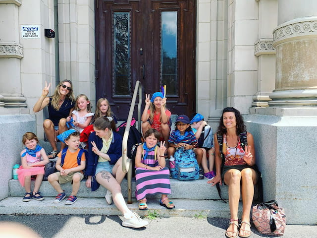 a group of people sitting on steps