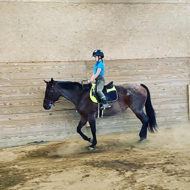 a man riding a horse
