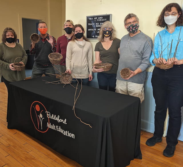 a group of people wearing masks
