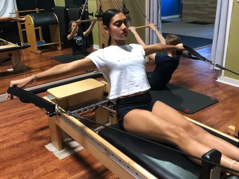 a woman working out on a gym