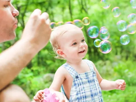 a person holding a baby