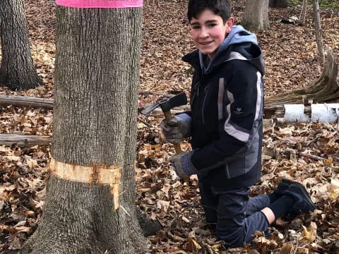 a boy holding a gun