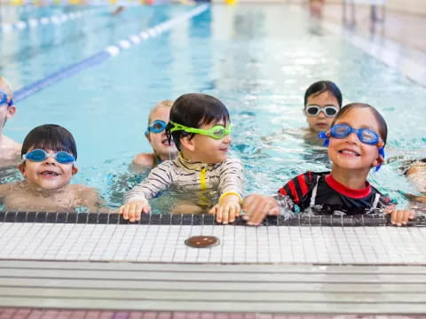 a group of kids wearing goggles