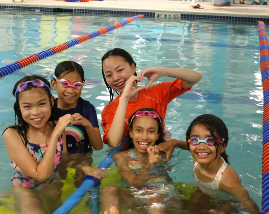 a group of people in a pool