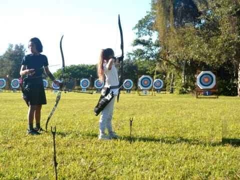 a group of people playing archery