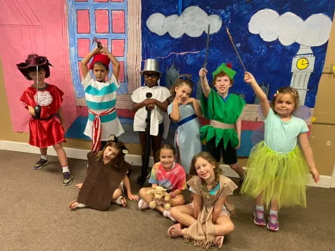 a group of children in clothing