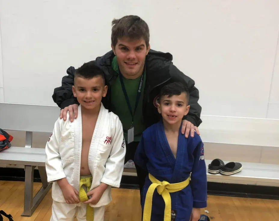 a person and two boys