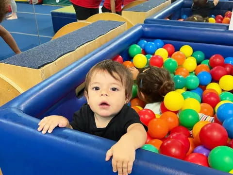 a child in a ball pit