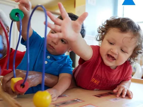 a couple of kids playing with toys