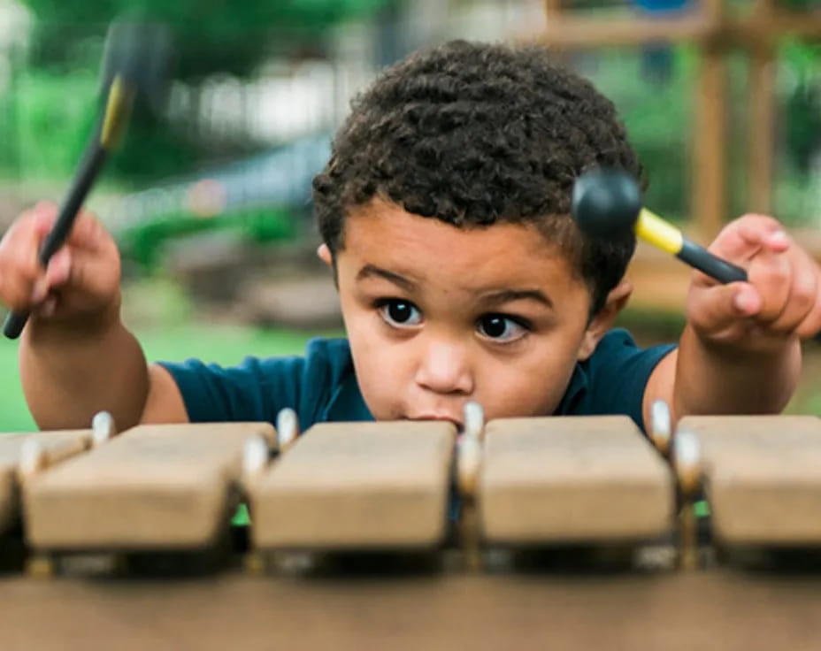a boy with a hammer