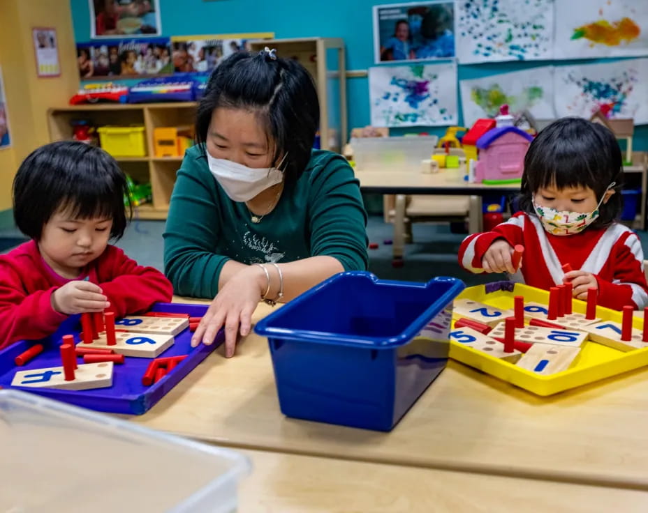 a few children playing with toys