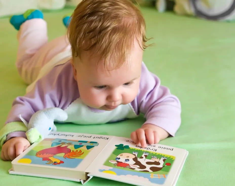 a baby playing with a toy
