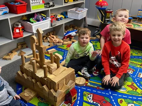 a group of kids playing with toys