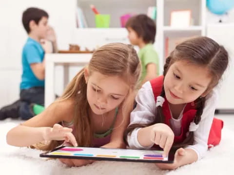 a few children studying together
