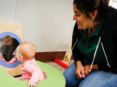 a woman and a baby