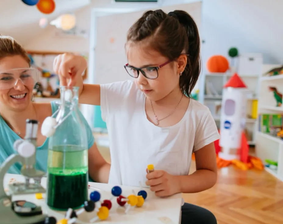 a person and a girl in a lab
