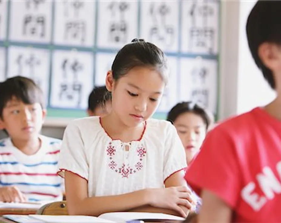 a group of children in a classroom