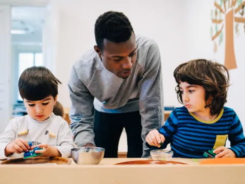 a man and two children