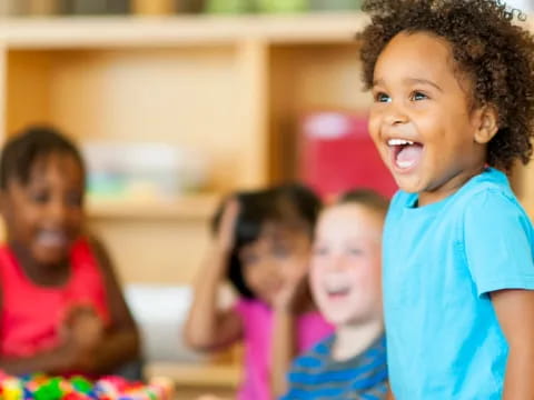 a group of children laughing
