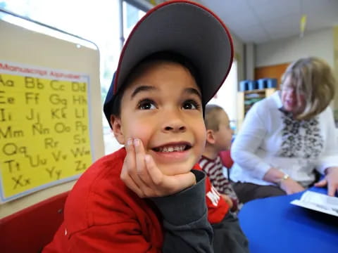 a boy wearing a hat