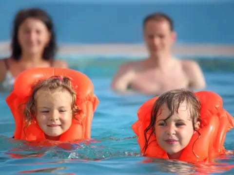a group of people in a pool