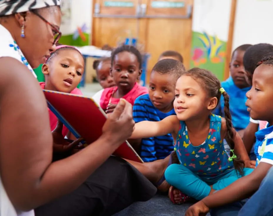 a person and a group of children