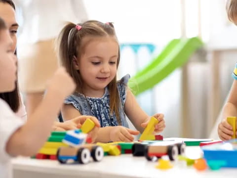 a few children playing with toys