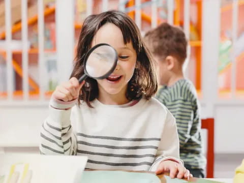 a young girl wearing a vr headset