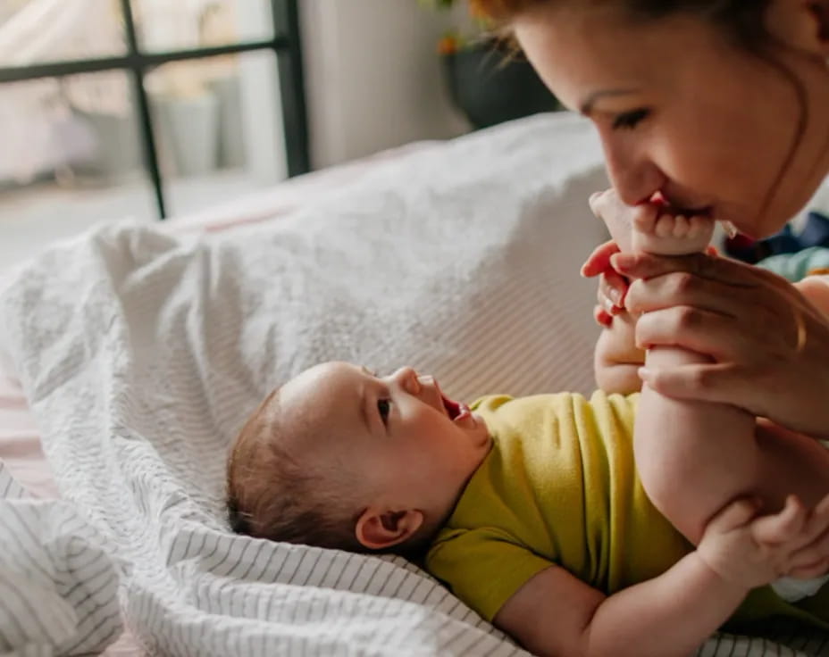 a person holding a baby