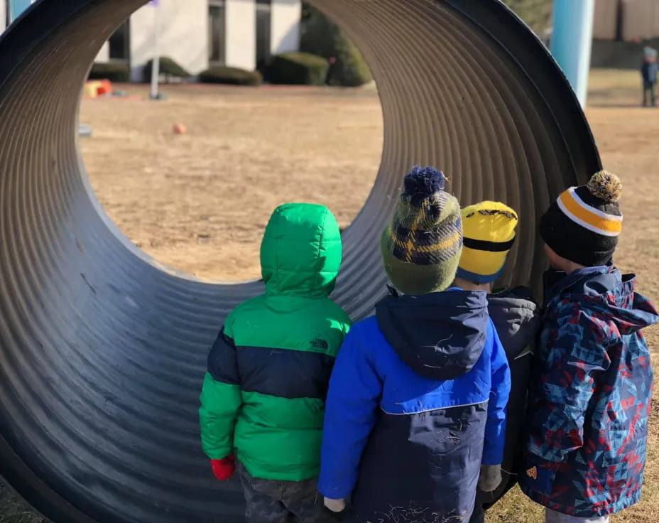 a group of children wearing clothing