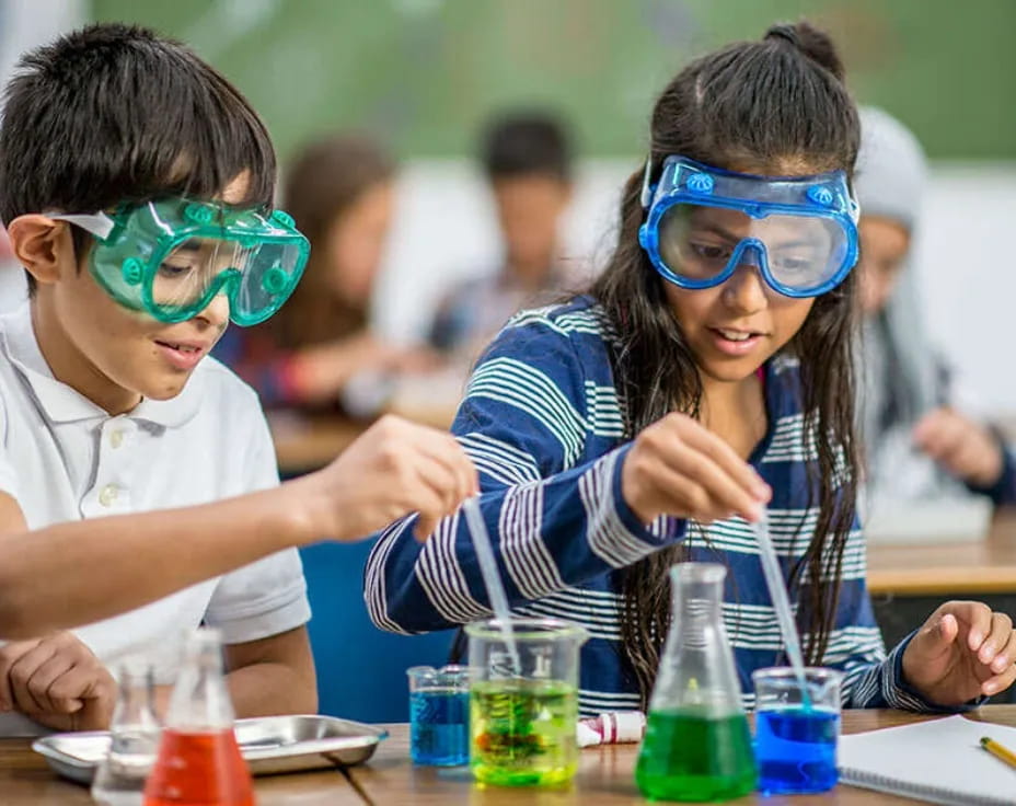 a couple of kids wearing goggles