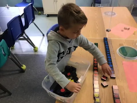 a child using a machine