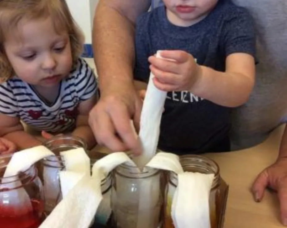 a person and a child making food