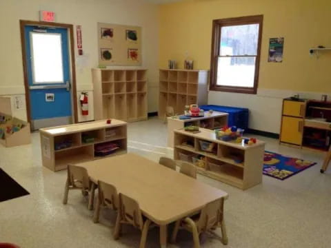 a room with a table and chairs