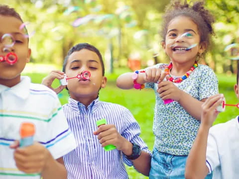 a group of kids with bubbles
