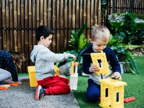 children playing in the sand