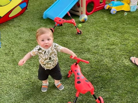 a baby playing with toys