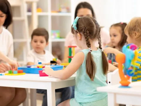 a group of children in a classroom