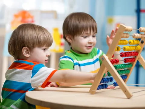 a couple of boys playing with toys