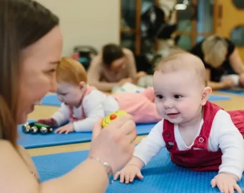 a person holding a baby