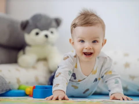 a baby sitting at a table