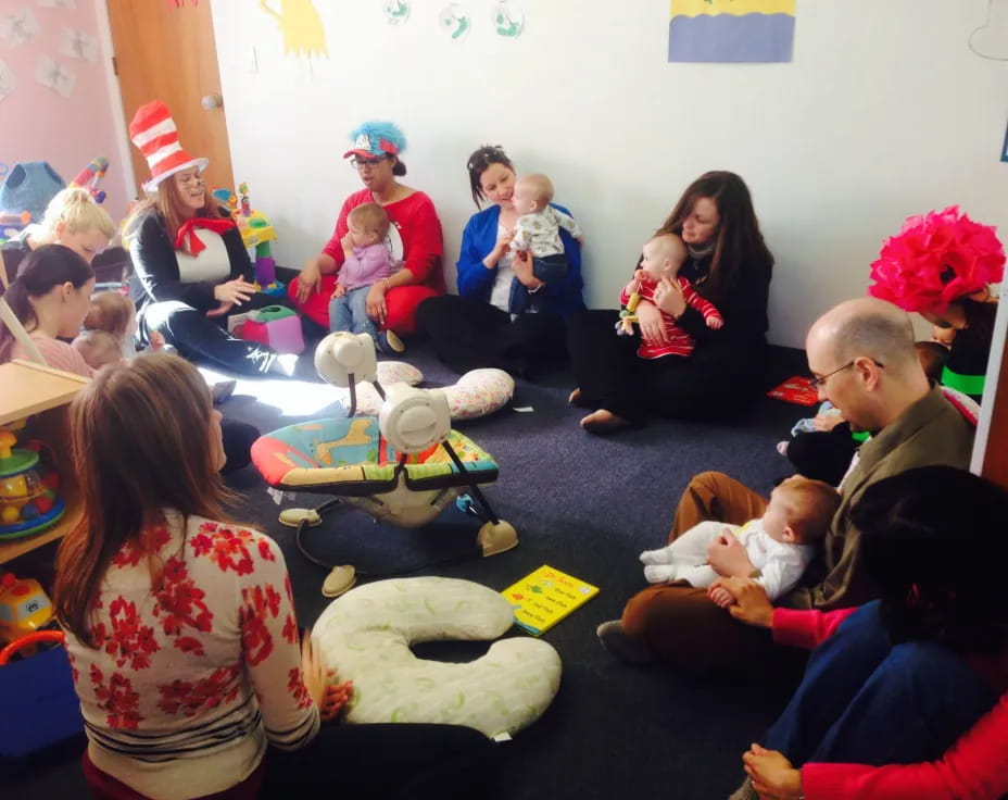 a group of people sitting in a room