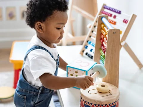 a child playing with a toy