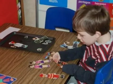 a child playing with a toy