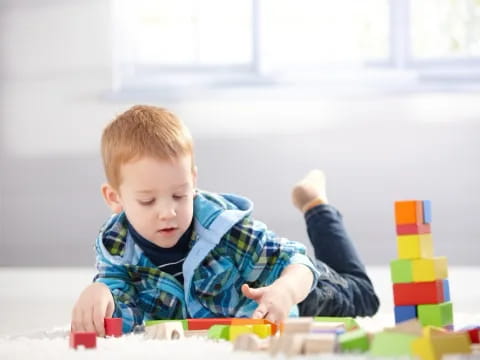a baby playing with toys