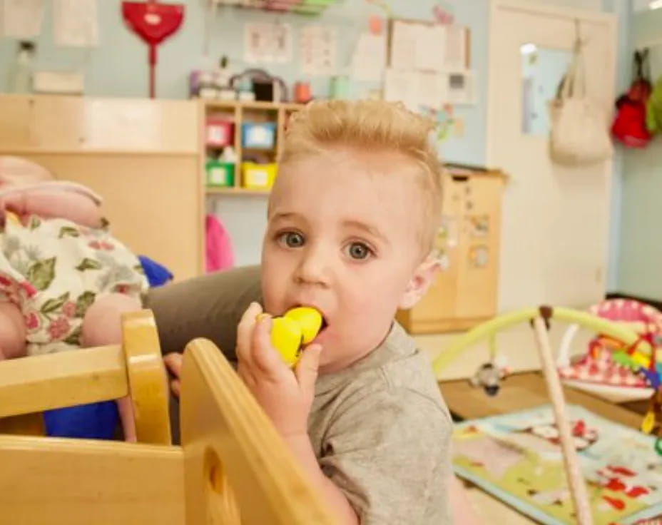 a boy eating a banana
