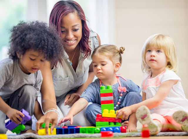 a person and a group of children