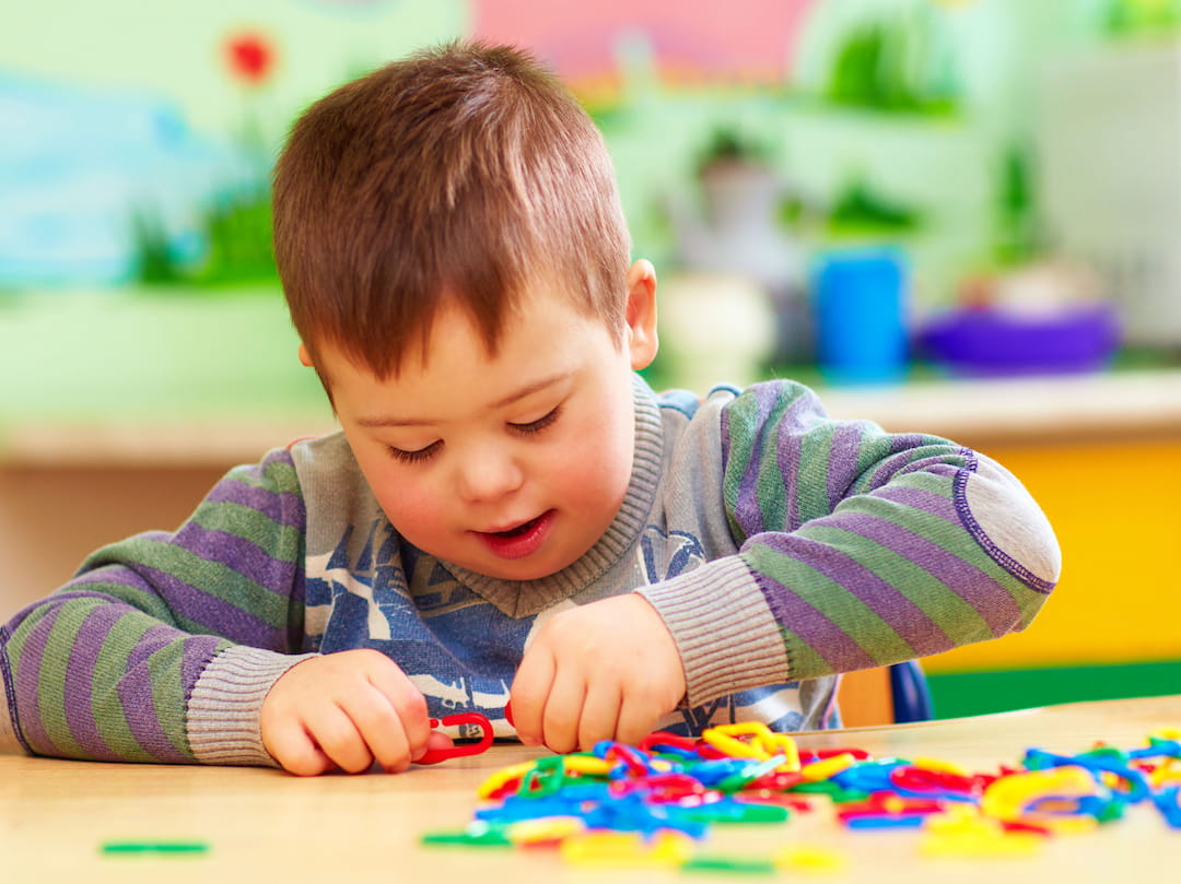 a baby playing with toys